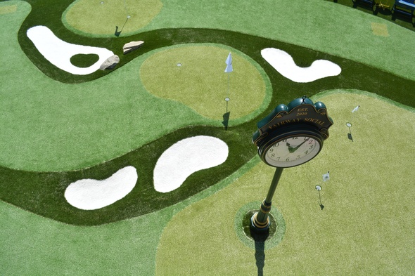 Austin Synthetic grass golf course with sand traps and golfers